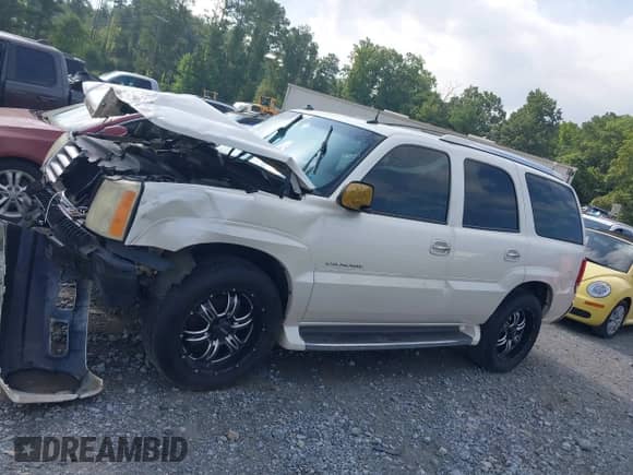 2003 Cadillac Escalade with VIN 1GYEK63N03R151151, listed as a IAAI auction lot 42757949 with 245,465 mi miles and . Bid and sale history available at DreamBid. Image 14.