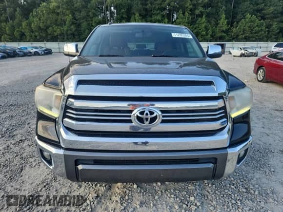 2016 Toyota Tundra Platinum with VIN 5TFGW5F16GX208427, listed as a Copart auction lot 71295365 with 150,184 mi miles and Salvage title. Bid and sale history available at DreamBid. Image 5.