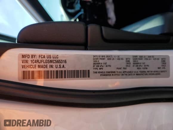2021 Jeep Grand Cherokee Trailhawk z VIN 1C4RJFLG5MC565316, wystawiony jako Copart lot #60751955 z przebiegiem 69 261 mil mil oraz Szkoda całkowita • Salvage title. Historia ofert i sprzedaży dostępna na DreamBid. Obrazek 13.