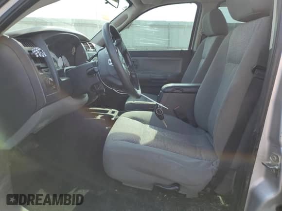 2010 Dodge Dakota Bighorn/Lonestar z VIN 1D7CW3GKXAS172178, wystawiony jako Copart lot #55134685 z przebiegiem 198 220 mil mil oraz Szkoda całkowita • Salvage title. Historia ofert i sprzedaży dostępna na DreamBid. Obrazek 7.