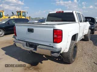 2017 Chevrolet Silverado 1500 LT z VIN 3GCPCREC5HG170813, wystawiony jako IAAI lot #43228209 z przebiegiem 168 071 mil mil oraz . Historia ofert i sprzedaży dostępna na DreamBid. Obrazek 4.