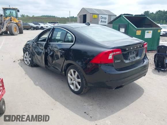 2016 Volvo S60 T5 Drive-E Premier z VIN YV126MFKXG2390847, wystawiony jako IAAI lot #42647884 z przebiegiem 115 397 mil mil oraz . Historia ofert i sprzedaży dostępna na DreamBid. Obrazek 3.
