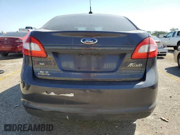 2012 Ford Fiesta SE с VIN 3FADP4BJ2CM170670, выставлен на аукционе Copart как лот 83793955 с пробегом 169 117 миль миль и Списание • Salvage title. История ставок и продаж доступна на DreamBid. Изображение 6.