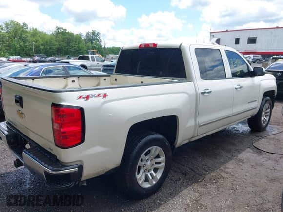 2014 Chevrolet Silverado 1500 LTZ with VIN 3GCUKSEC3EG312519, listed as a IAAI auction lot 42248191 with 141,707 mi miles and . Bid and sale history available at DreamBid. Image 4.
