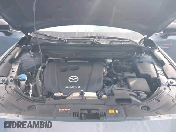 2022 Mazda CX-5 S Preferred z VIN JM3KFBCM3N0539261, wystawiony jako IAAI lot #43264779 z przebiegiem 60 847 mil mil oraz . Historia ofert i sprzedaży dostępna na DreamBid. Obrazek 10.