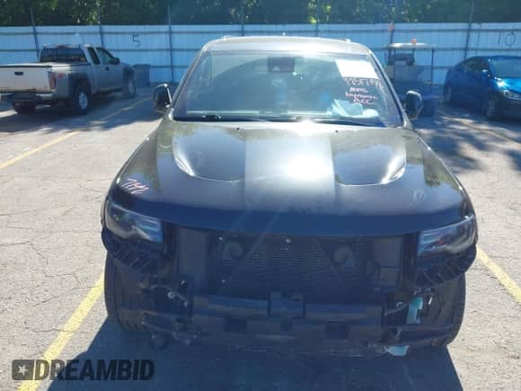 2016 Jeep Grand Cherokee SRT with VIN 1C4RJFDJ8GC306401, listed as a IAAI auction lot 42782259 with 116,318 mi miles and . Bid and sale history available at DreamBid. Image 13.