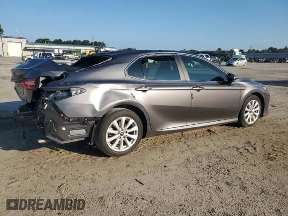 2019 Toyota Camry LE с VIN 4T1B11HK5KU794289, выставлен на аукционе Copart как лот 69141015 с пробегом 43 768 миль миль и Списание • Salvage title. История ставок и продаж доступна на DreamBid. Изображение 3.