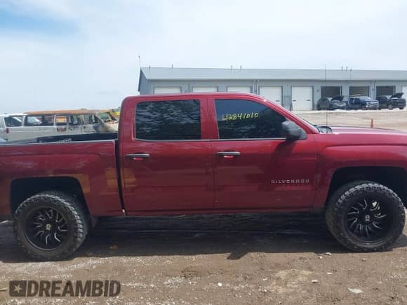 2014 Chevrolet Silverado 1500 LT z VIN 3GCUKREC6EG172457, wystawiony jako IAAI lot #42841010 z przebiegiem 180 569 mil mil oraz . Historia ofert i sprzedaży dostępna na DreamBid. Obrazek 13.