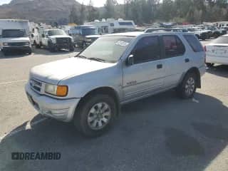 1999 Honda Passport LX с VIN 4S6CM58W2X4402860, выставлен на аукционе Copart как лот 42144655 с пробегом 176 706 миль миль и Чистый • Clean title. История ставок и продаж доступна на DreamBid. Изображение 1.