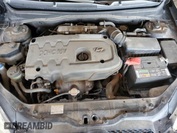 2008 Hyundai Accent GS z VIN KMHCM36C98U064395, wystawiony jako Copart lot #82670815 z przebiegiem 78 849 mil mil oraz Szkoda całkowita • Salvage title. Historia ofert i sprzedaży dostępna na DreamBid. Obrazek 11.