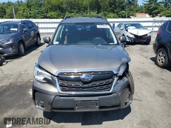 2017 Subaru Forester Touring z VIN JF2SJGWC1HH587274, wystawiony jako Copart lot #68068555 z przebiegiem Nie podano mil oraz Szkoda całkowita • Salvage title. Historia ofert i sprzedaży dostępna na DreamBid. Obrazek 5.