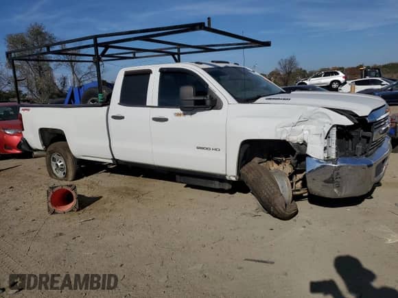 2016 Chevrolet Silverado 2500HD Work Truck with VIN 1GC2KUE84GZ185278, listed as a Copart auction lot 78777214 with 154,025 mi miles and Salvage title. Bid and sale history available at DreamBid. Image 4.