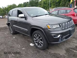 2017 Jeep Grand Cherokee Overland with VIN 1C4RJFCG0HC818791, listed as a IAAI auction lot 42574718 with 119,455 mi miles and . Bid and sale history available at DreamBid. Image 1.