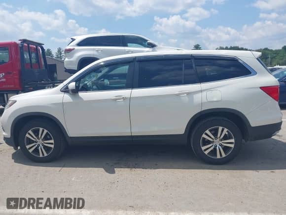 2017 Honda Pilot EX-L with VIN 5FNYF6H77HB017722, listed as a IAAI auction lot 42800151 with 94,457 mi miles and . Bid and sale history available at DreamBid. Image 14.