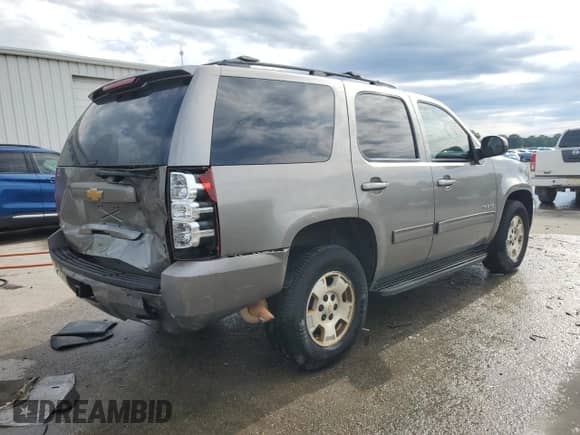 2012 Chevrolet Tahoe LS с VIN 1GNSCAE00CR179615, выставлен на аукционе Copart как лот 55651675 с пробегом 205 436 миль миль и Списание • Salvage title. История ставок и продаж доступна на DreamBid. Изображение 3.