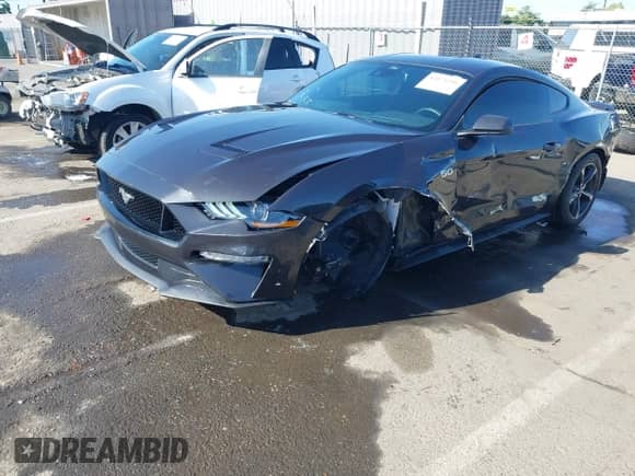 2022 Ford Mustang GT with VIN 1FA6P8CF6N5135181, listed as a IAAI auction lot 42171291 with 22,371 mi miles and . Bid and sale history available at DreamBid. Image 20.