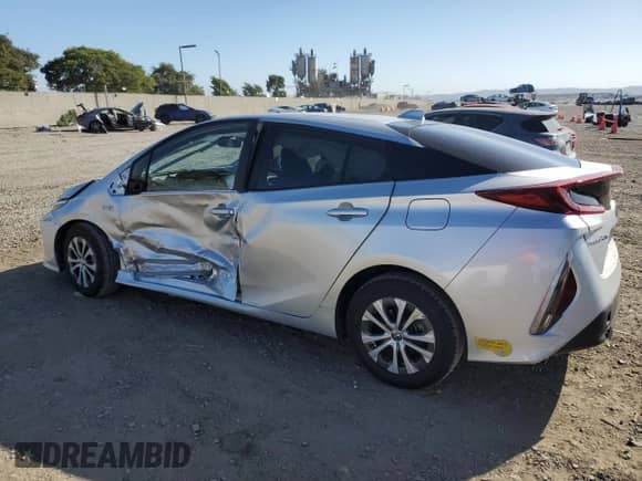2022 Toyota Prius XLE with VIN JTDKAMFP6N3205877, listed as a Copart auction lot 87436815 with 34,381 mi miles and Salvage title. Bid and sale history available at DreamBid. Image 2.