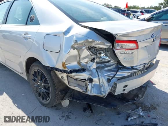 2013 Toyota Camry LE z VIN 4T1BD1FK1DU070466, wystawiony jako IAAI lot #42118169 z przebiegiem 144 680 mil mil oraz . Historia ofert i sprzedaży dostępna na DreamBid. Obrazek 6.