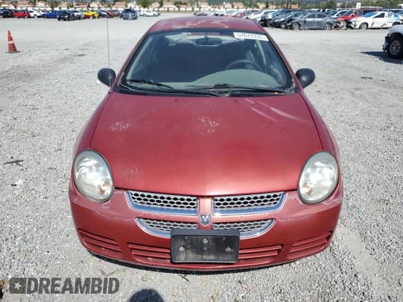 2005 Dodge Neon SXT with VIN 1B3ES56C75D186166, listed as a Copart auction lot 57673335 with 131,345 mi miles and Salvage title. Bid and sale history available at DreamBid. Image 5.