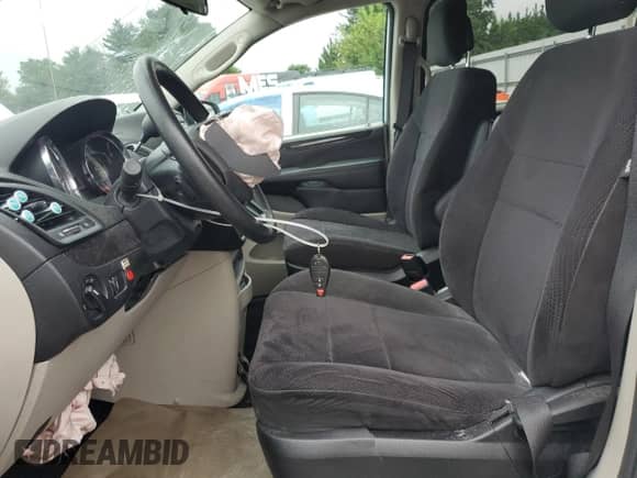 2013 Dodge Grand Caravan SE with VIN 2C4RDGBG2DR813544, listed as a Copart auction lot 69126495 with 116,344 mi miles and Salvage title. Bid and sale history available at DreamBid. Image 7.