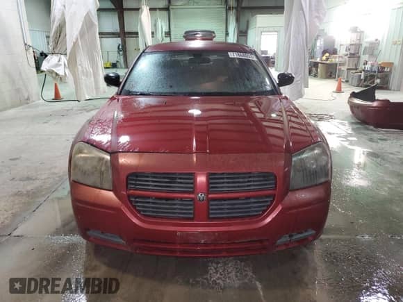 2007 Dodge Magnum with VIN 2D4FV47T47H701989, listed as a Copart auction lot 71868053 with 117,909 mi miles and Salvage title. Bid and sale history available at DreamBid. Image 5.