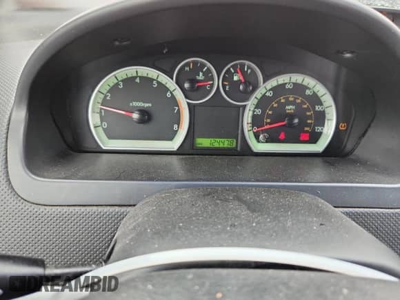 2011 Chevrolet Aveo 2LT z VIN KL1TG6DE1BB128196, wystawiony jako Copart lot #66508375 z przebiegiem 124 478 mil mil oraz Szkoda całkowita • Salvage title. Historia ofert i sprzedaży dostępna na DreamBid. Obrazek 9.