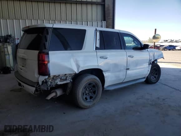 2015 Chevrolet Tahoe with VIN 1GNSK2KC0FR607050, listed as a Copart auction lot 83579774 with 221,252 mi miles and Salvage title. Bid and sale history available at DreamBid. Image 3.