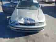 1991 Honda Accord EX z VIN JHMCB756XMC801180, wystawiony jako IAAI lot #43504248 z przebiegiem 268 067 mil mil oraz . Historia ofert i sprzedaży dostępna na DreamBid. Obrazek 6.