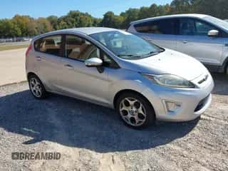 2012 Ford Fiesta SES with VIN 3FADP4FJ1CM103567, listed as a IAAI auction lot 43534438 with 164,583 mi miles and . Bid and sale history available at DreamBid. Image 1.