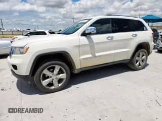2011 Jeep Grand Cherokee Overland with VIN 1J4RR6GG6BC643452, listed as a Copart auction lot 62930455 with 166,284 mi miles and Salvage title. Bid and sale history available at DreamBid. Image 1.