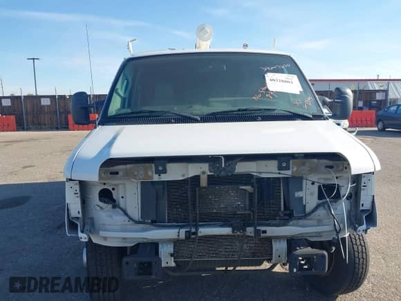 2012 Ford Econoline Cargo Commercial with VIN 1FTNE1EW3CDB06188, listed as a IAAI auction lot 40328803 with 138,502 mi miles and . Bid and sale history available at DreamBid. Image 6.