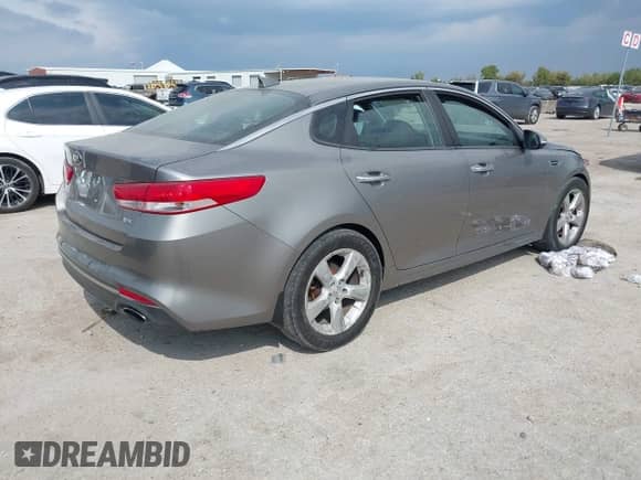 2016 Kia Optima EX with VIN 5XXGU4L34GG059142, listed as a IAAI auction lot 43519874 with 141,445 mi miles and . Bid and sale history available at DreamBid. Image 4.