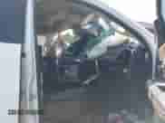 2014 Ram 1500 Laramie with VIN 1C6RR6NT9ES100703, listed as a IAAI auction lot 39869453 with Not provided miles and . Bid and sale history available at DreamBid. Image 5.