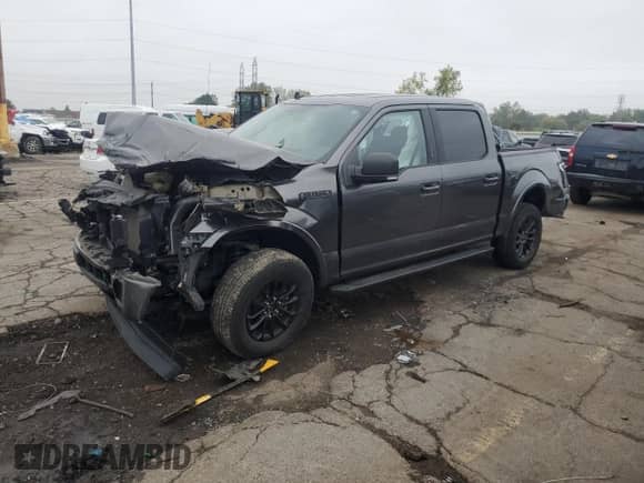 2020 Ford F-150 XLT with VIN 1FTEW1E4XLFB14398, listed as a Copart auction lot 83850395 with 58,236 mi miles and Salvage title. Bid and sale history available at DreamBid. Image 1.