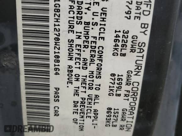 1998 Saturn SC z VIN 1G8ZH1270WZ108164, wystawiony jako Copart lot #65145955 z przebiegiem 169 421 mil mil oraz Szkoda całkowita • Salvage title. Historia ofert i sprzedaży dostępna na DreamBid. Obrazek 12.