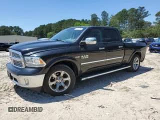 2016 Ram 1500 Laramie z VIN 1C6RR7VT7GS323038, wystawiony jako Copart lot #57514995 z przebiegiem 167 054 mil mil oraz Szkoda całkowita • Salvage title. Historia ofert i sprzedaży dostępna na DreamBid. Obrazek 1.