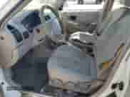 2003 Hyundai Accent GL z VIN KMHCG45C73U427901, wystawiony jako Copart lot #63874575 z przebiegiem 134 268 mil mil oraz Szkoda całkowita • Salvage title. Historia ofert i sprzedaży dostępna na DreamBid. Obrazek 7.