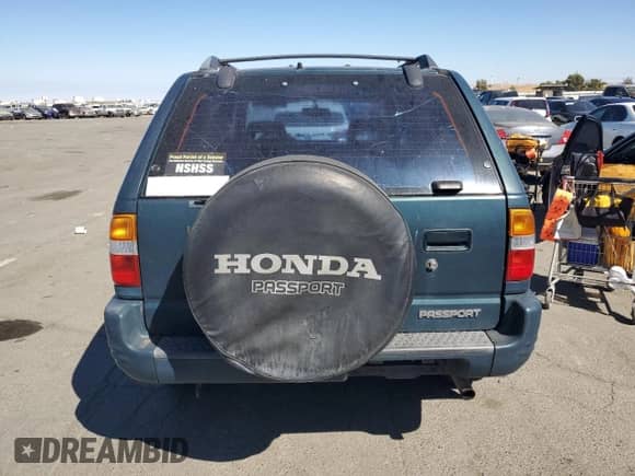 1998 Honda Passport LX with VIN 4S6CK58W6W4403286, listed as a Copart auction lot 70248784 with 84,627 mi miles and Clean title. Bid and sale history available at DreamBid. Image 6.