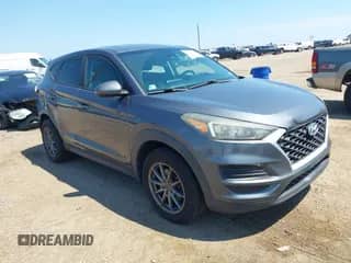 2019 Hyundai Tucson SE z VIN KM8J23A40KU916007, wystawiony jako IAAI lot #43043749 z przebiegiem 132 109 mil mil oraz . Historia ofert i sprzedaży dostępna na DreamBid. Obrazek 1.