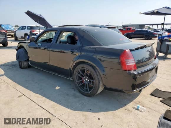 2007 Chrysler 300 C SRT-8 with VIN 2C3LA73W27H821999, listed as a Copart auction lot 66556735 with Not provided miles and Salvage title. Bid and sale history available at DreamBid. Image 2.