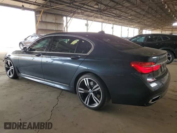 2017 BMW 7 Series 750i with VIN WBA7F0C51HGM21410, listed as a Copart auction lot 80801545 with 75,738 mi miles and Salvage title. Bid and sale history available at DreamBid. Image 2.
