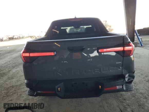 2022 Hyundai Santa Cruz SE с VIN 5NTJADAE7NH009969, выставлен на аукционе Copart как лот 42262335 с пробегом 25 017 миль миль и Списание • Salvage title. История ставок и продаж доступна на DreamBid. Изображение 6.