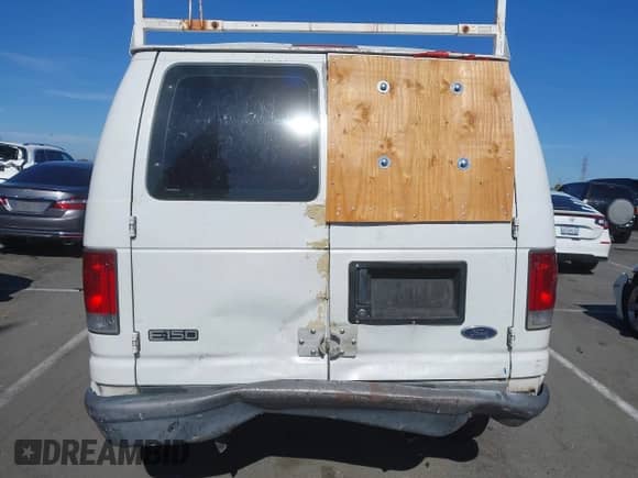 2005 Ford Econoline Cargo with VIN 1FTRE14W85HA90035, listed as a IAAI auction lot 42625257 with 204,929 mi miles and . Bid and sale history available at DreamBid. Image 16.