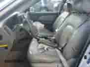 2003 Hyundai Sonata GLS with VIN KMHWF35H23A873106, listed as a Copart auction lot 64790315 with 164,238 mi miles and Salvage title. Bid and sale history available at DreamBid. Image 7.