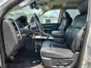 2014 Ram 1500 Laramie with VIN 1C6RR6NT0ES397960, listed as a Copart auction lot 61458895 with 148,298 mi miles and Salvage title. Bid and sale history available at DreamBid. Image 7.