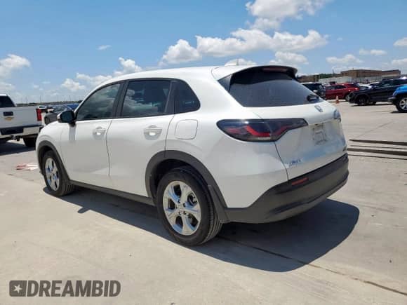 2023 Honda HR-V LX с VIN 3CZRZ1H3XPM716892, выставлен на аукционе Copart как лот 62596585 с пробегом 74 529 миль миль и Чистый • Clean title. История ставок и продаж доступна на DreamBid. Изображение 2.