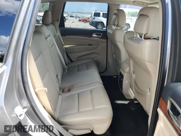 2012 Jeep Grand Cherokee Limited z VIN 1C4RJEBG7CC276299, wystawiony jako Copart lot #64085755 z przebiegiem 86 272 mil mil oraz Szkoda całkowita • Salvage title. Historia ofert i sprzedaży dostępna na DreamBid. Obrazek 11.