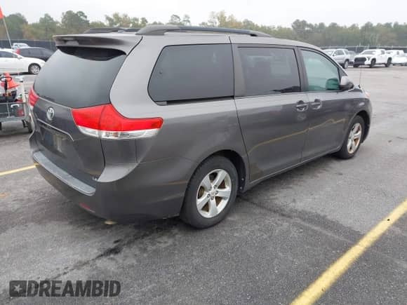 2012 Toyota Sienna LE with VIN 5TDKK3DC2CS262161, listed as a IAAI auction lot 43543505 with 218,722 mi miles and . Bid and sale history available at DreamBid. Image 4.
