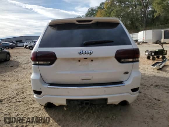 2016 Jeep Grand Cherokee High Altitude with VIN 1C4RJECG7GC382479, listed as a Copart auction lot 80772364 with 132,276 mi miles and Salvage title. Bid and sale history available at DreamBid. Image 6.