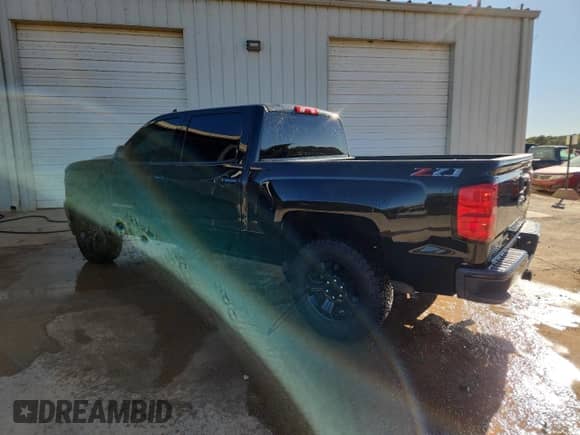 2018 Chevrolet Silverado 1500 LT z VIN 3GCUKREC9JG247985, wystawiony jako Copart lot #89700785 z przebiegiem 176 054 mil mil oraz Czysty tytuł • Clean title. Historia ofert i sprzedaży dostępna na DreamBid. Obrazek 2.